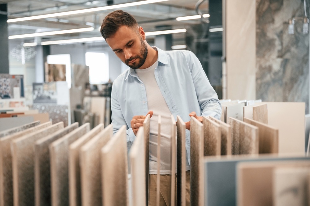 Customer browsing stone tile samples